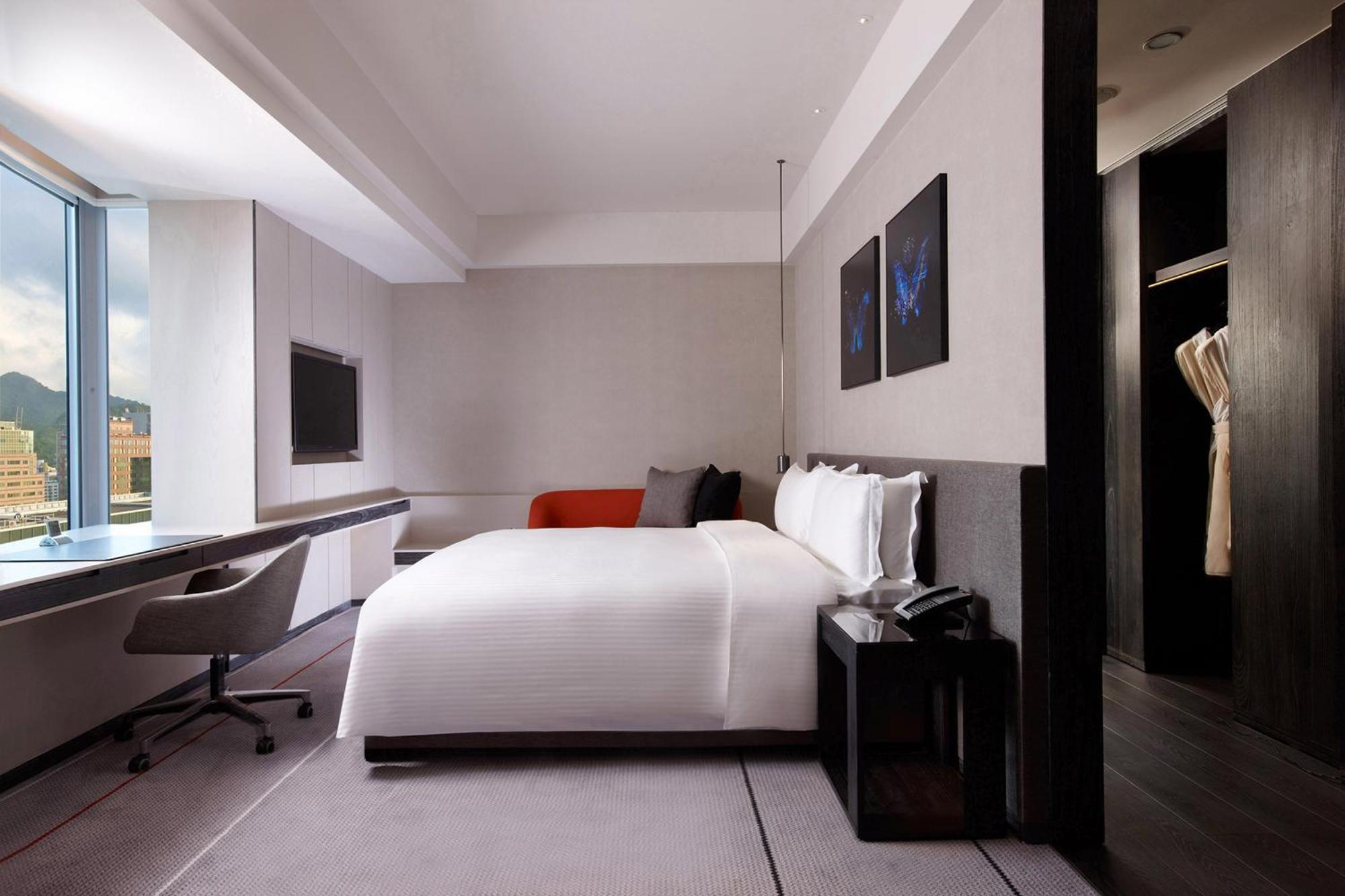 Hotel Humble House Taipei Extérieur photo A room at the hotel