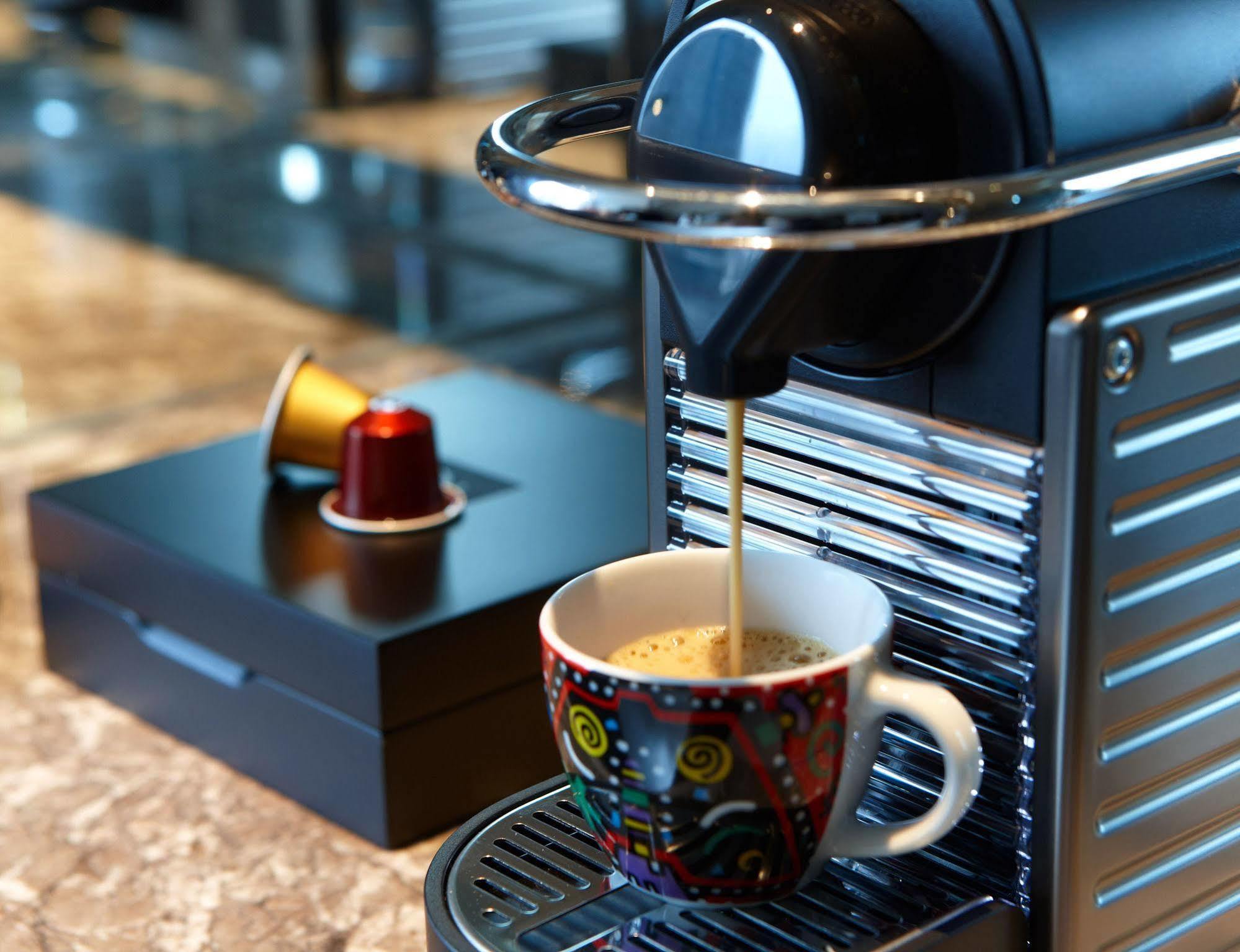 Hotel Humble House Taipei Extérieur photo A Nespresso machine